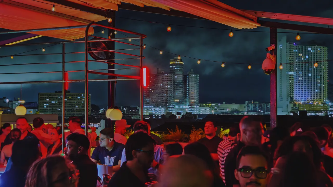 Rooftop at night overlooking the city
