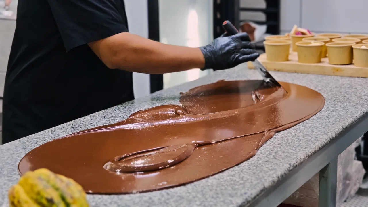 Chocolate being tempered during a chocolate-making class