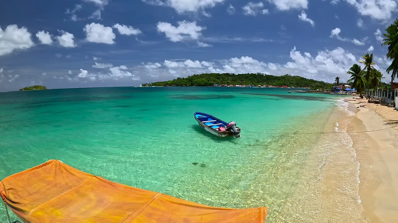 Beach and boat overlooking Isla Grande